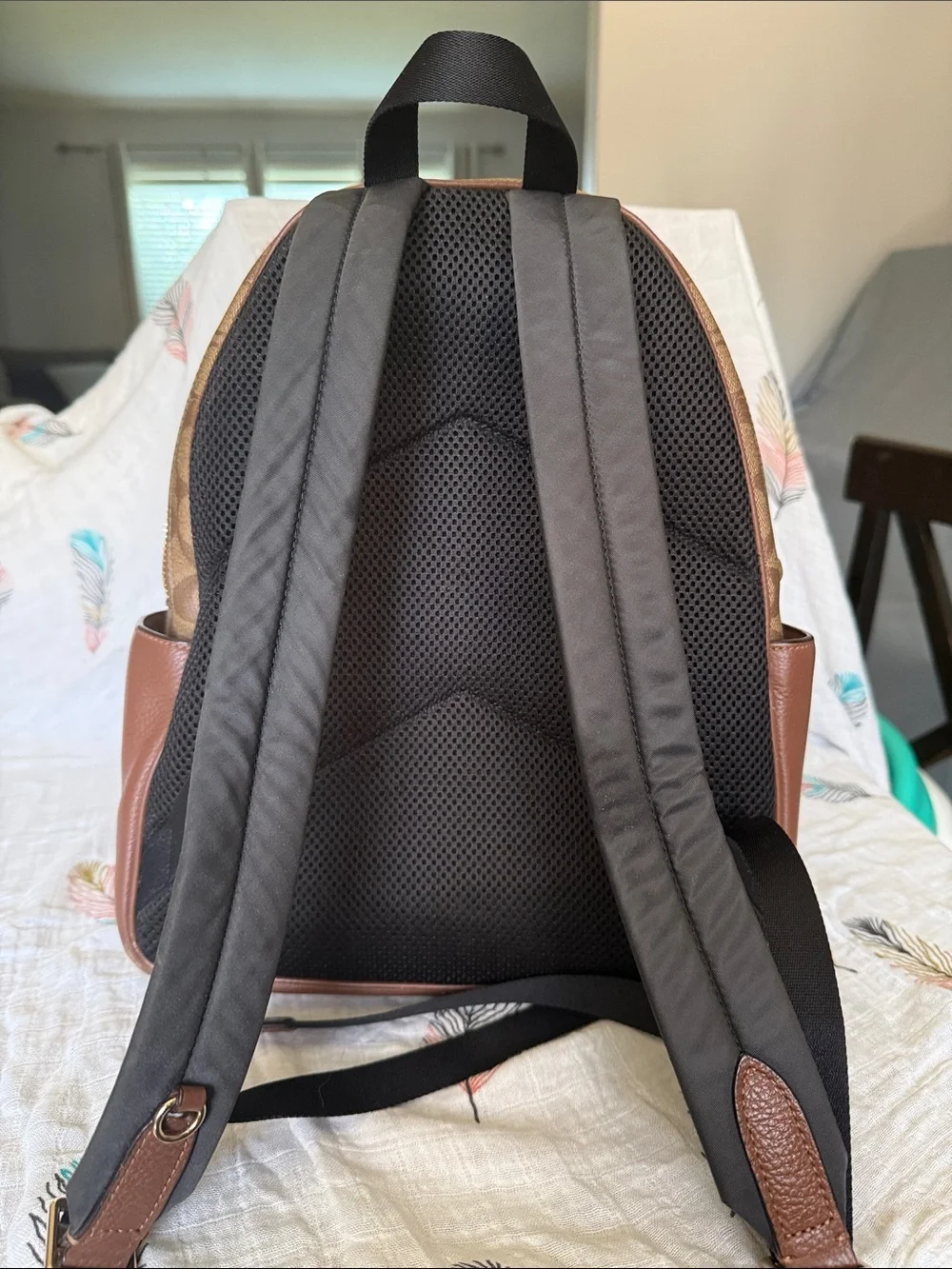 Coach Brown Signature Leather Backpack with gold hardware
